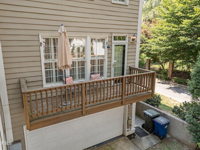 717 Mcclure Dr, Raleigh, NC 27603 - wooden terrace with a garage