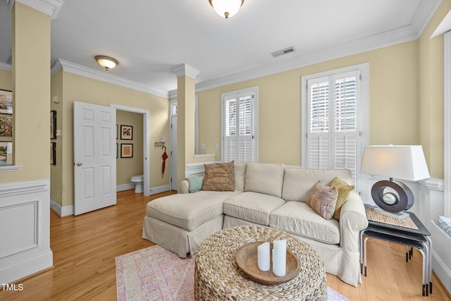717 Mcclure Dr, Raleigh, NC 27603 - living area featuring crown molding and light wood-style floors