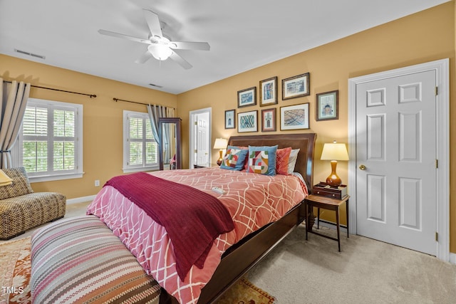 717 Mcclure Dr, Raleigh, NC 27603 - carpeted bedroom with baseboards and ceiling fan
