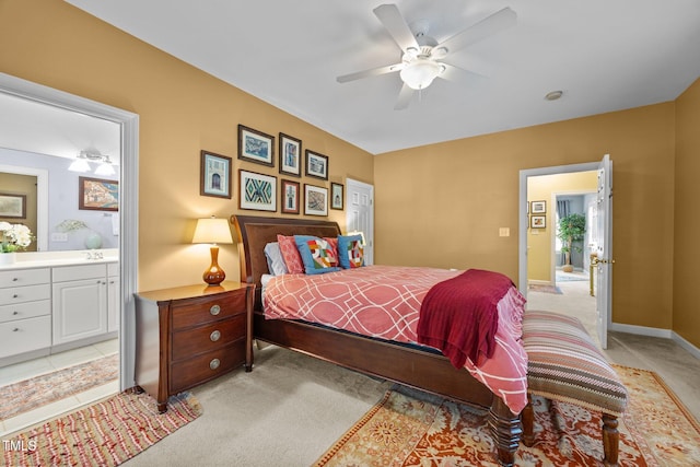 717 Mcclure Dr, Raleigh, NC 27603 - bedroom with light carpet, connected bathroom, and ceiling fan