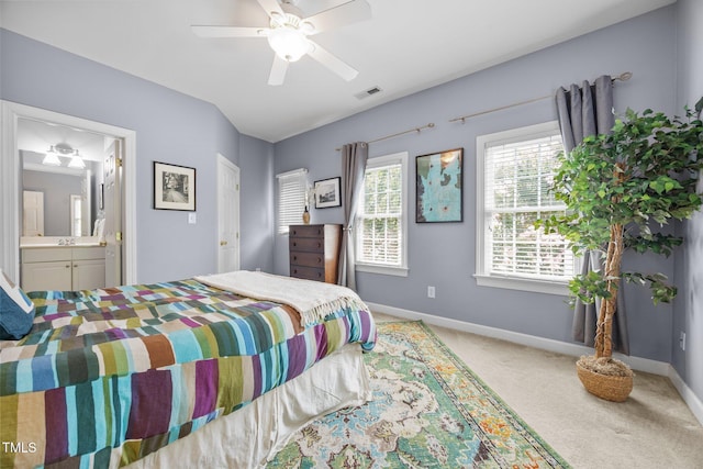 717 Mcclure Dr, Raleigh, NC 27603 - carpeted bedroom featuring ensuite bathroom and ceiling fan