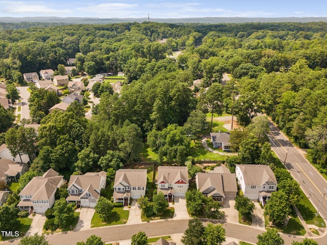 3806 Stoneybrook Dr, Durham, NC 27705 - aerial perspective of suburban area with a forest