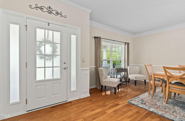3806 Stoneybrook Dr, Durham, NC 27705 - foyer with crown molding and light wood-style flooring