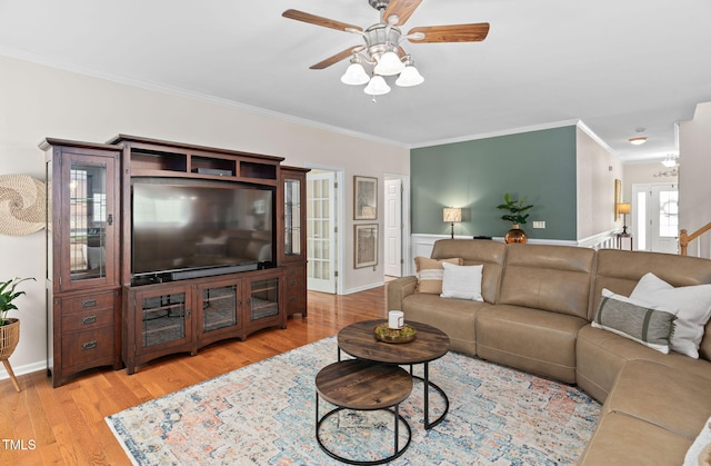 3806 Stoneybrook Dr, Durham, NC 27705 - living area with crown molding, a ceiling fan, and light wood finished floors