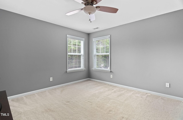 3806 Stoneybrook Dr, Durham, NC 27705 - carpeted empty room with baseboards and a ceiling fan