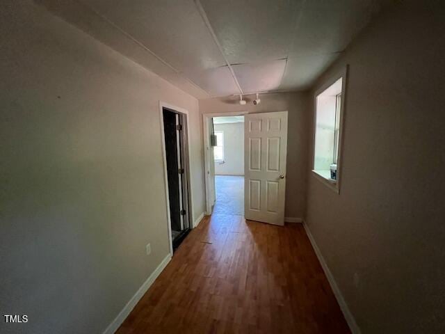 162 Black Horse Ln, Kittrell, NC 27544 - hallway with baseboards and wood finished floors