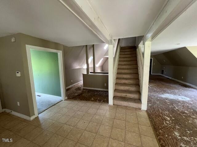 162 Black Horse Ln, Kittrell, NC 27544 - staircase featuring lofted ceiling and baseboards