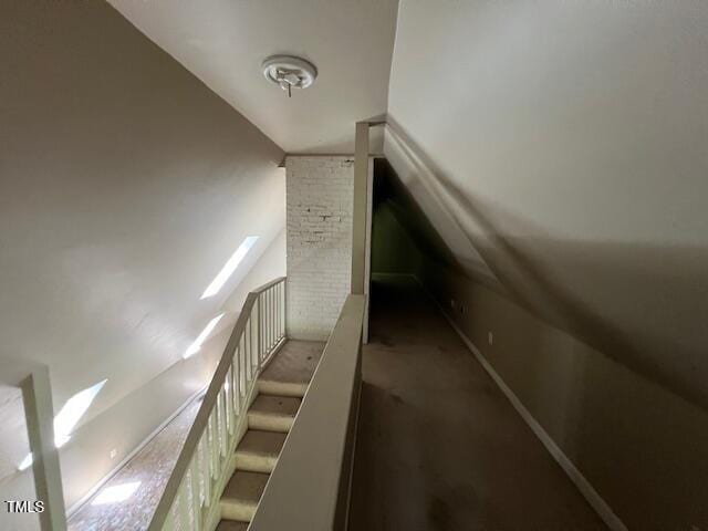 162 Black Horse Ln, Kittrell, NC 27544 - staircase featuring lofted ceiling and carpet floors
