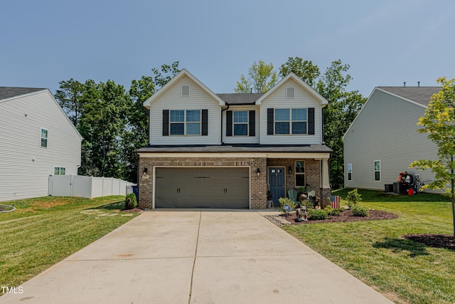 2586 Lacey Holt Rd, Graham, NC 27253 - view of front of property featuring brick siding, an attached garage, concrete driveway, and a gate