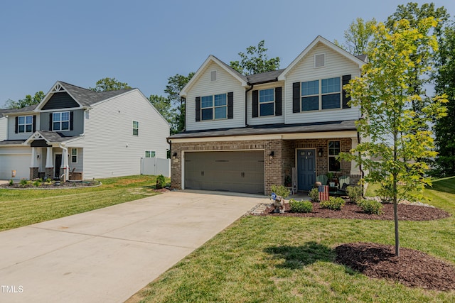 2586 Lacey Holt Rd, Graham, NC 27253 - craftsman-style home featuring brick siding, an attached garage, concrete driveway, a front lawn, and a porch