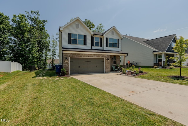 2586 Lacey Holt Rd, Graham, NC 27253 - view of front of home with a garage, brick siding, and driveway