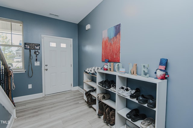 2586 Lacey Holt Rd, Graham, NC 27253 - foyer with wood finished floors and baseboards