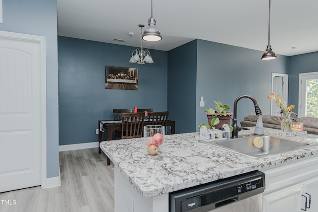 2586 Lacey Holt Rd, Graham, NC 27253 - kitchen featuring dishwasher, a chandelier, white cabinets, pendant lighting, and light wood-style flooring