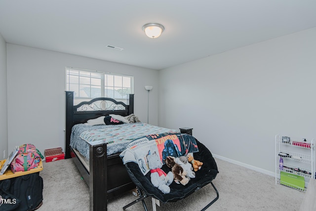 2586 Lacey Holt Rd, Graham, NC 27253 - bedroom with carpet flooring and baseboards