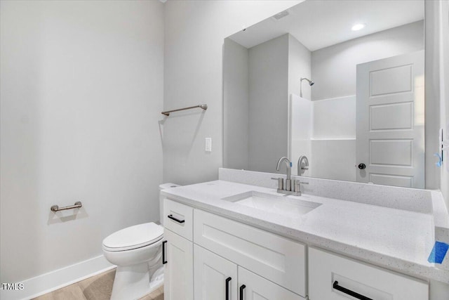 106 W Church St, Nashville, NC 27856 - full bathroom with vanity, a shower, and wood finished floors