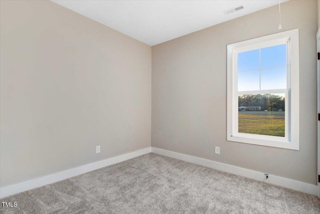 106 W Church St, Nashville, NC 27856 - spare room with carpet flooring and baseboards