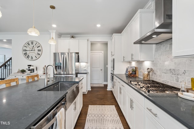 2013 Latham Oaks Ave, Wake Forest, NC 27587 - kitchen with wall chimney range hood, appliances with stainless steel finishes, crown molding, white cabinets, and backsplash