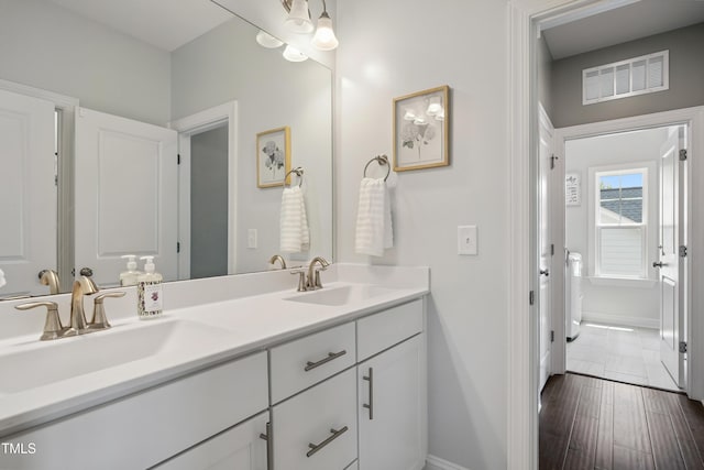 2013 Latham Oaks Ave, Wake Forest, NC 27587 - full bathroom with double vanity and baseboards