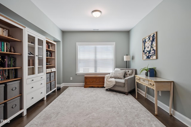 2013 Latham Oaks Ave, Wake Forest, NC 27587 - sitting room featuring dark wood-style flooring and baseboards