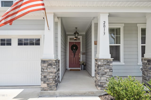 2013 Latham Oaks Ave, Wake Forest, NC 27587 - property entrance featuring stone siding and a porch