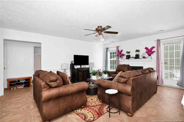 2140 Fargo Dr, Fayetteville, NC 28306 - living room featuring a fireplace, healthy amount of natural light, and a ceiling fan