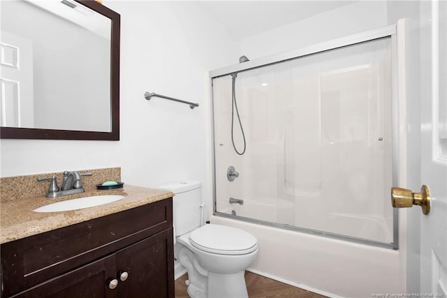 2140 Fargo Dr, Fayetteville, NC 28306 - full bath with vanity, enclosed tub / shower combo, and wood finished floors