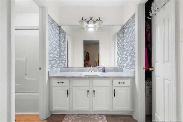 2140 Fargo Dr, Fayetteville, NC 28306 - bathroom featuring vanity and wood finished floors