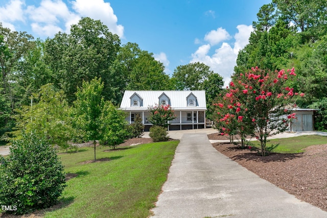 1408 Old Ivey Rd, Apex, NC 27523 - cape cod home featuring asphalt driveway, a front yard, a porch, and a metal roof