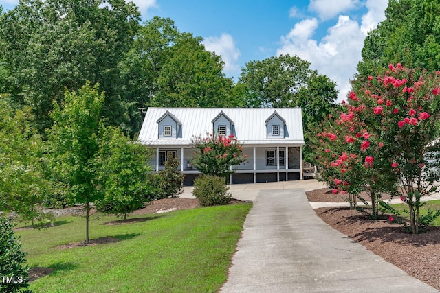 1408 Old Ivey Rd, Apex, NC 27523 - cape cod house with a front yard, covered porch, a metal roof, and driveway