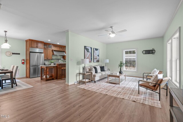 1408 Old Ivey Rd, Apex, NC 27523 - living area with light wood-type flooring, a ceiling fan, and recessed lighting