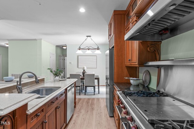 1408 Old Ivey Rd, Apex, NC 27523 - kitchen with extractor fan, appliances with stainless steel finishes, brown cabinets, light wood finished floors, and glass insert cabinets