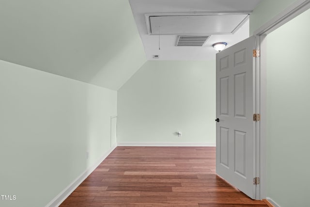 1408 Old Ivey Rd, Apex, NC 27523 - bonus room with attic access, wood finished floors, and vaulted ceiling