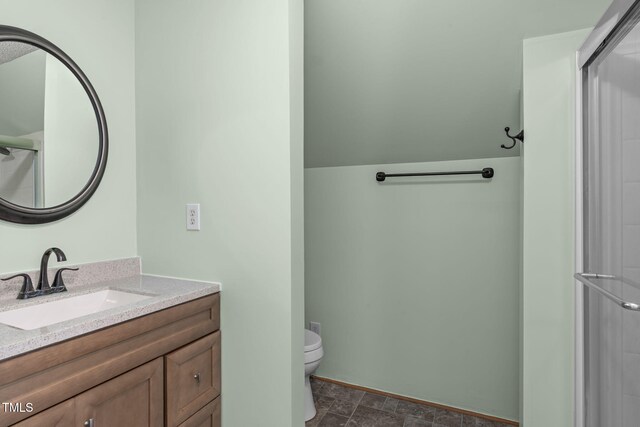 1408 Old Ivey Rd, Apex, NC 27523 - full bathroom with vanity, stone finish flooring, and a shower