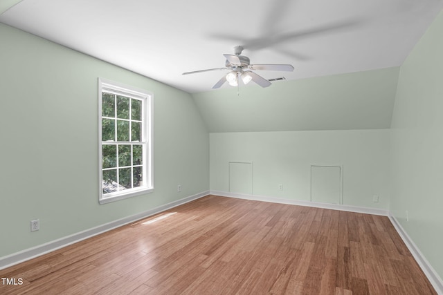 1408 Old Ivey Rd, Apex, NC 27523 - bonus room featuring a ceiling fan, wood finished floors, and vaulted ceiling