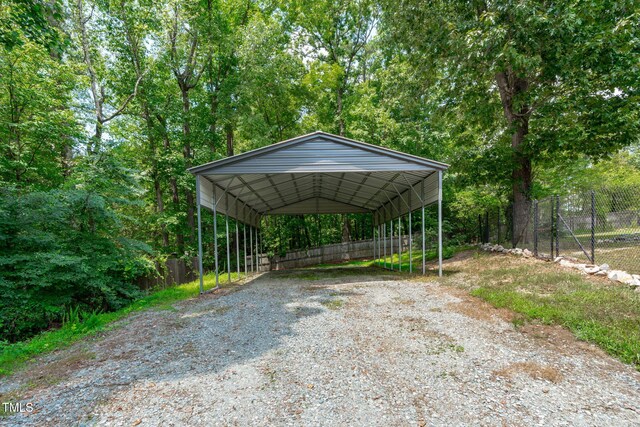 1408 Old Ivey Rd, Apex, NC 27523 - view of parking with a carport and gravel driveway