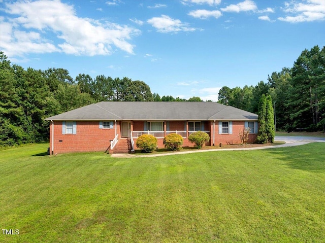 1379 Dr Martin Luther King Jr Blvd, Warrenton, NC 27589 - single story home with a porch, brick siding, and a front yard