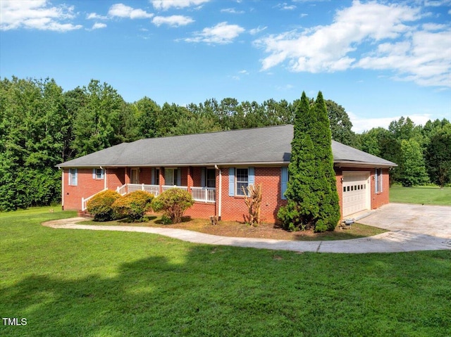 1379 Dr Martin Luther King Jr Blvd, Warrenton, NC 27589 - ranch-style home featuring a garage, brick siding, covered porch, and a front yard