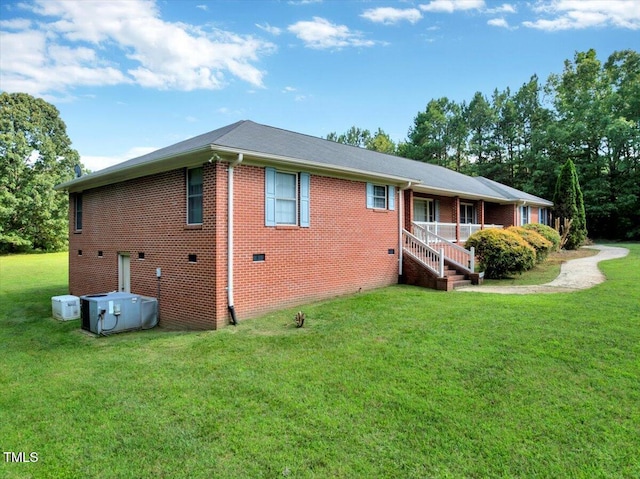 1379 Dr Martin Luther King Jr Blvd, Warrenton, NC 27589 - back of property with a yard and brick siding