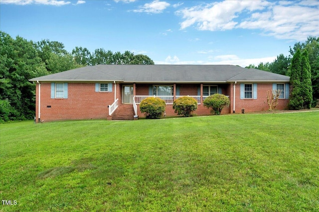 1379 Dr Martin Luther King Jr Blvd, Warrenton, NC 27589 - single story home with a front lawn and brick siding