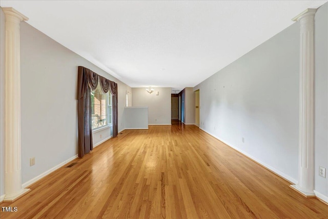 1379 Dr Martin Luther King Jr Blvd, Warrenton, NC 27589 - unfurnished room with ornate columns and light wood-type flooring