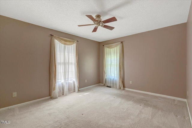 1379 Dr Martin Luther King Jr Blvd, Warrenton, NC 27589 - carpeted empty room featuring plenty of natural light, ceiling fan, and a textured ceiling