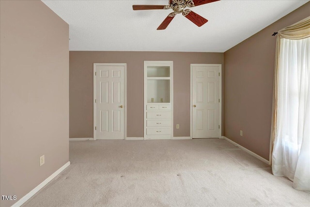 1379 Dr Martin Luther King Jr Blvd, Warrenton, NC 27589 - unfurnished bedroom with light carpet and ceiling fan