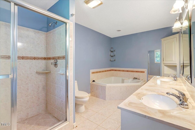 1379 Dr Martin Luther King Jr Blvd, Warrenton, NC 27589 - bathroom with a bath, tile patterned floors, a stall shower, double vanity, and a textured ceiling