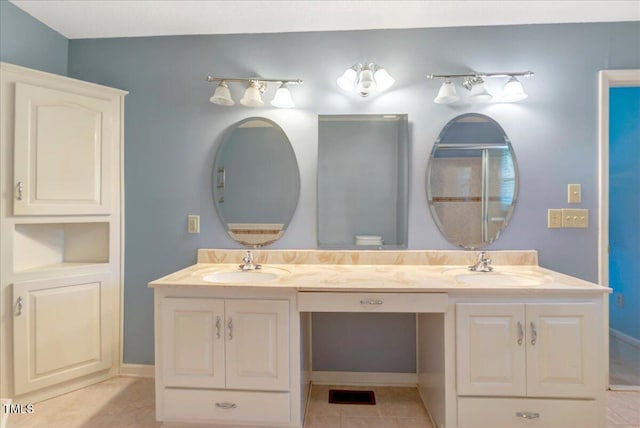 1379 Dr Martin Luther King Jr Blvd, Warrenton, NC 27589 - bathroom featuring double vanity and tile patterned flooring