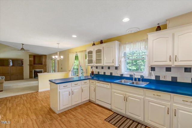 1379 Dr Martin Luther King Jr Blvd, Warrenton, NC 27589 - kitchen with dishwasher, a fireplace, healthy amount of natural light, a peninsula, and recessed lighting