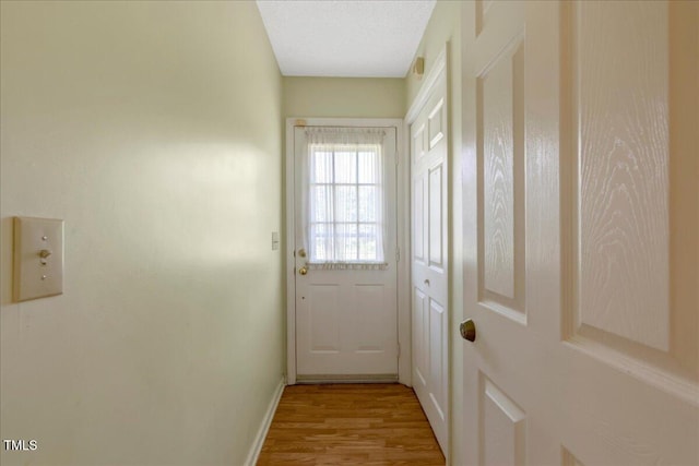 1379 Dr Martin Luther King Jr Blvd, Warrenton, NC 27589 - doorway featuring wood finished floors and baseboards