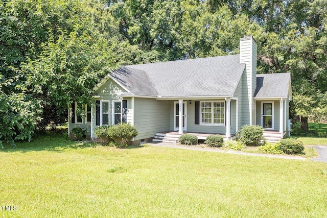 2474 Sumter Dr, Garner, NC 27529 - view of front facade featuring covered porch, a shingled roof, a front yard, and crawl space