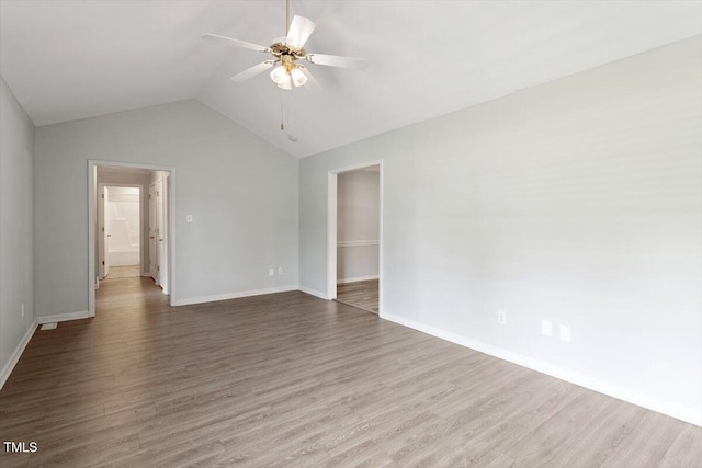 2474 Sumter Dr, Garner, NC 27529 - empty room featuring a ceiling fan, lofted ceiling, and wood finished floors