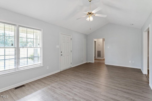 2474 Sumter Dr, Garner, NC 27529 - unfurnished living room featuring lofted ceiling, ceiling fan, and wood finished floors
