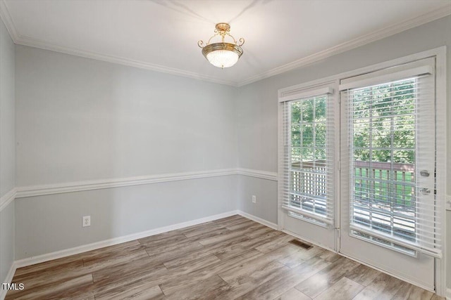 2474 Sumter Dr, Garner, NC 27529 - unfurnished room with wood finished floors and crown molding